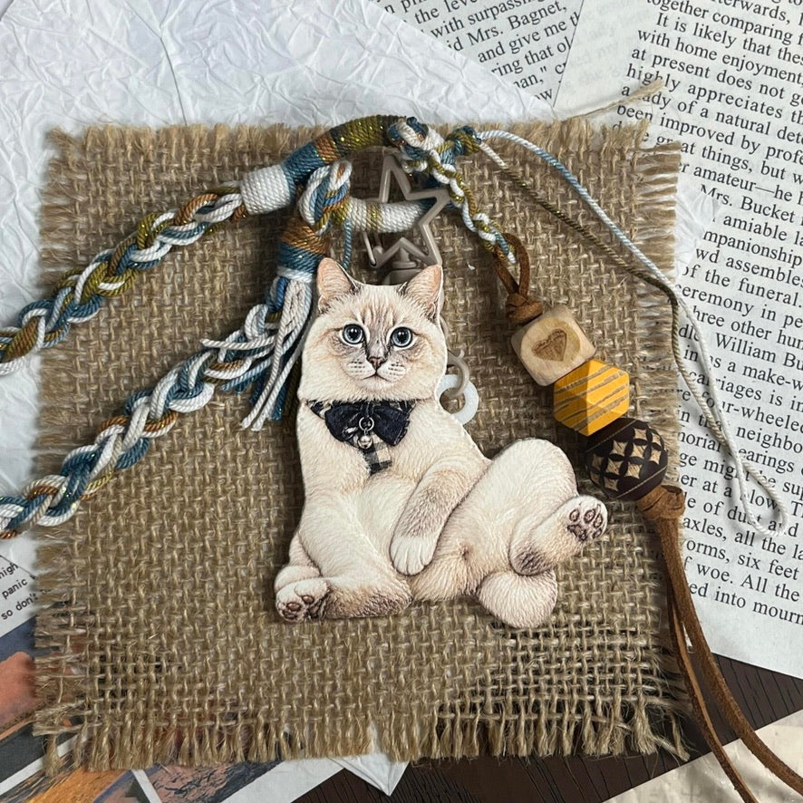A personalized 3D pet photo keychain showcasing a touchable hand-painted cat charm.