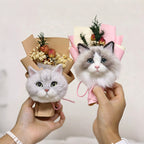 Two cat-shaped flower bouquets held by hands against a plain background