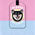 Luggage tag with a dog illustration and text on a pink and blue background