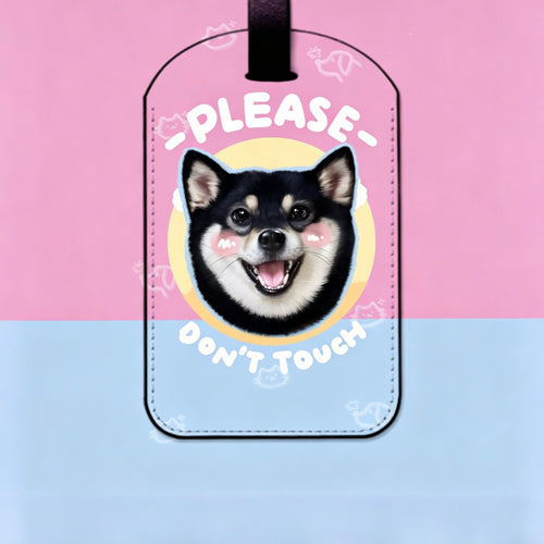 Luggage tag with a dog illustration and text on a pink and blue background