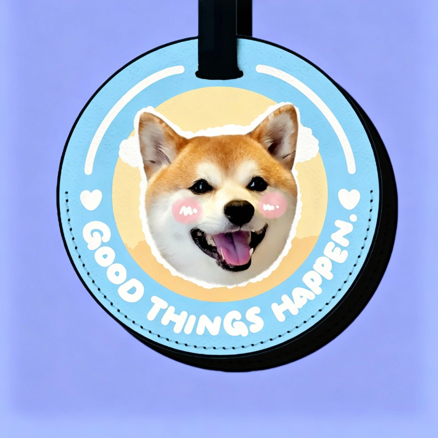 Circular tag with a dog's face and 'Good Things Happen' text on a purple background
