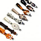 Collection of dog-themed lanyards on a white background