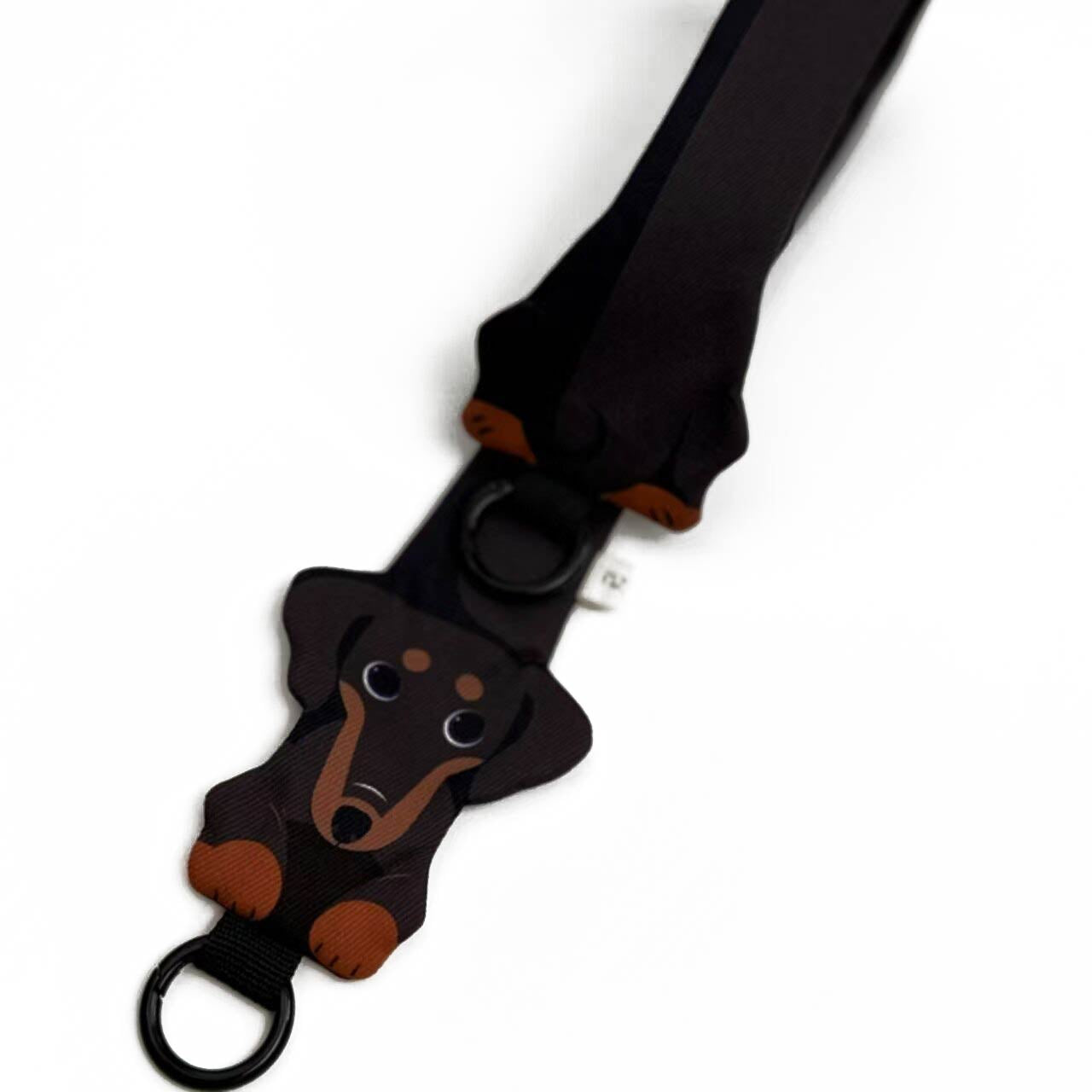 Black strap with a dachshund dog design on a white background