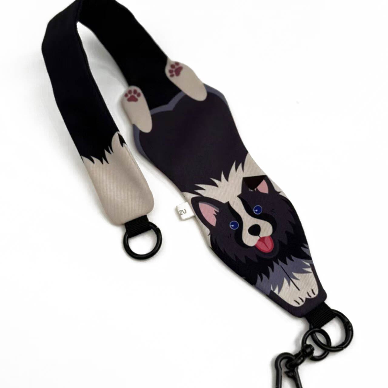 Dog-themed strap with a cartoon dog design on a white background