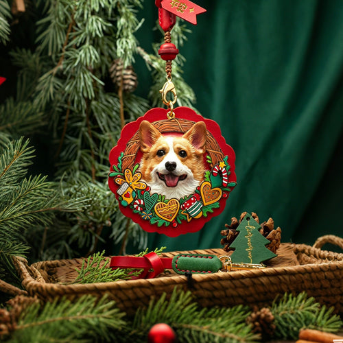 Dog ornament with festive design hanging on a Christmas tree