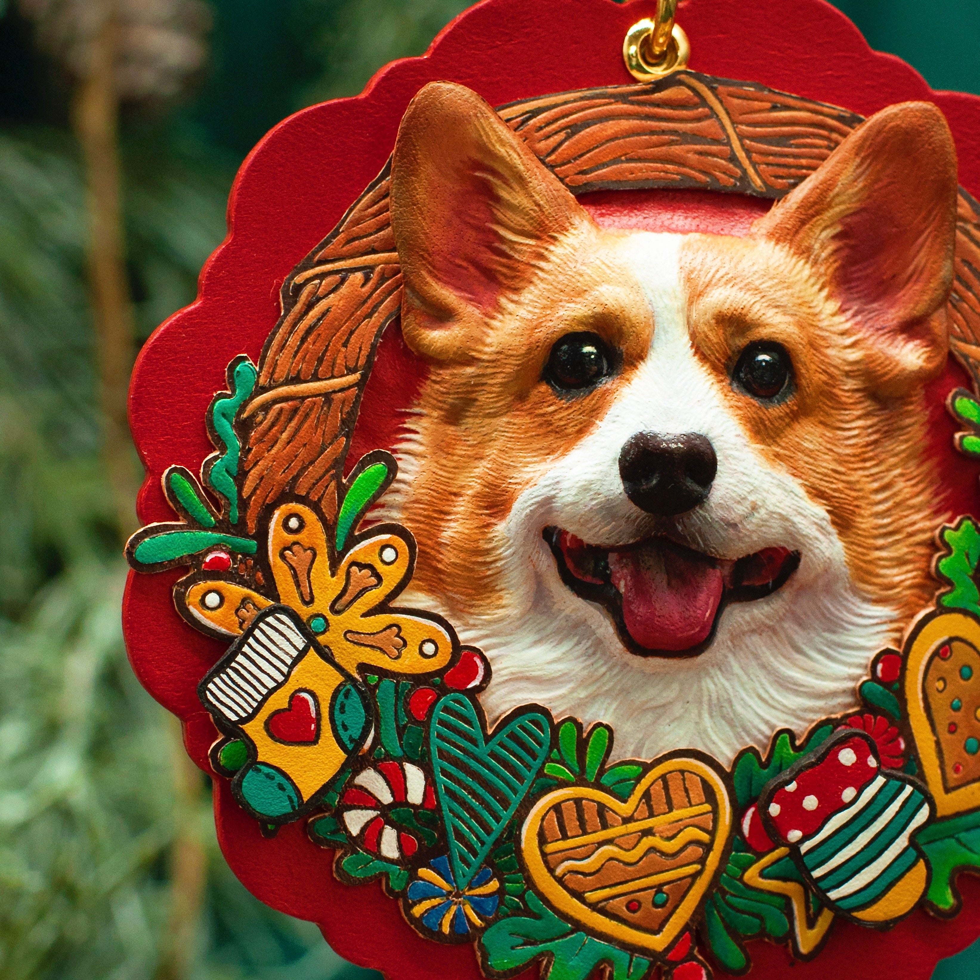 Decorative ornament with a corgi dog design and festive elements on a red background.