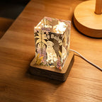 Bespoke K9 glass pet photo engraving night light showcased as elegant tabletop decor on a modern living room table.