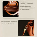 Brown leather handbag with gold hardware, showing internal structure and hardware details.