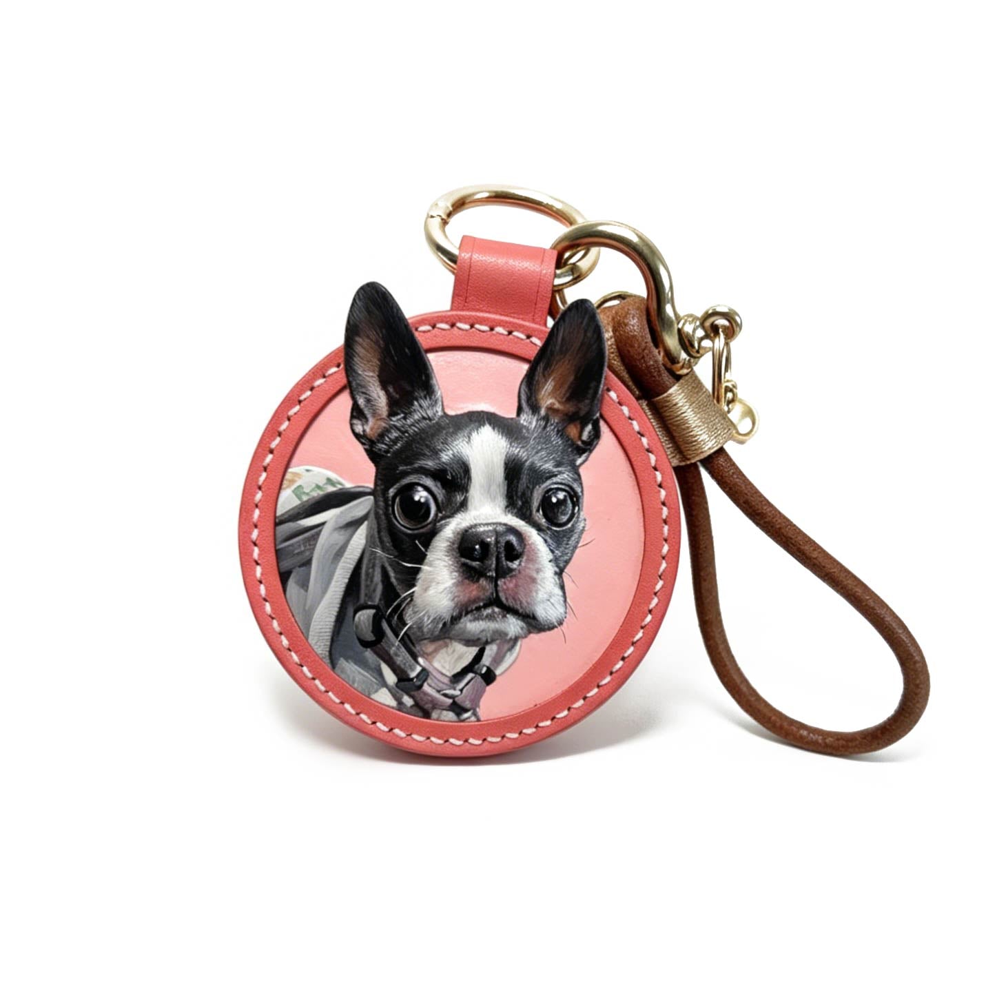 Keychain with a dog illustration on a pink background