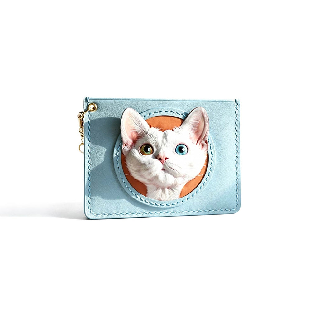 Light blue cardholder with a cat design on a white background