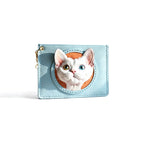 Light blue cardholder with a cat design on a white background