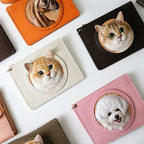Collection of small pouches with pet faces on a white background