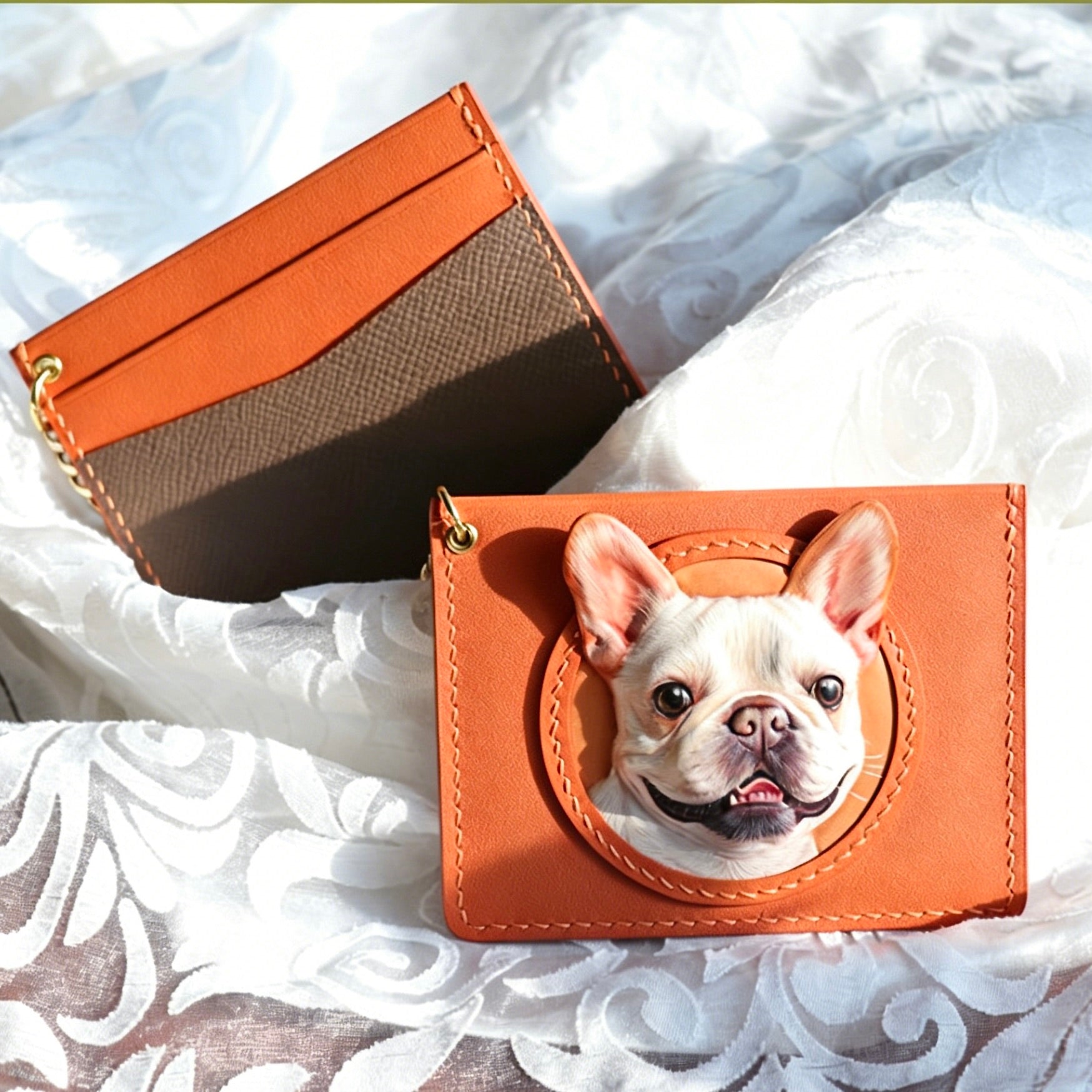 Brown leather cardholder with a dog's face design on a white textured surface