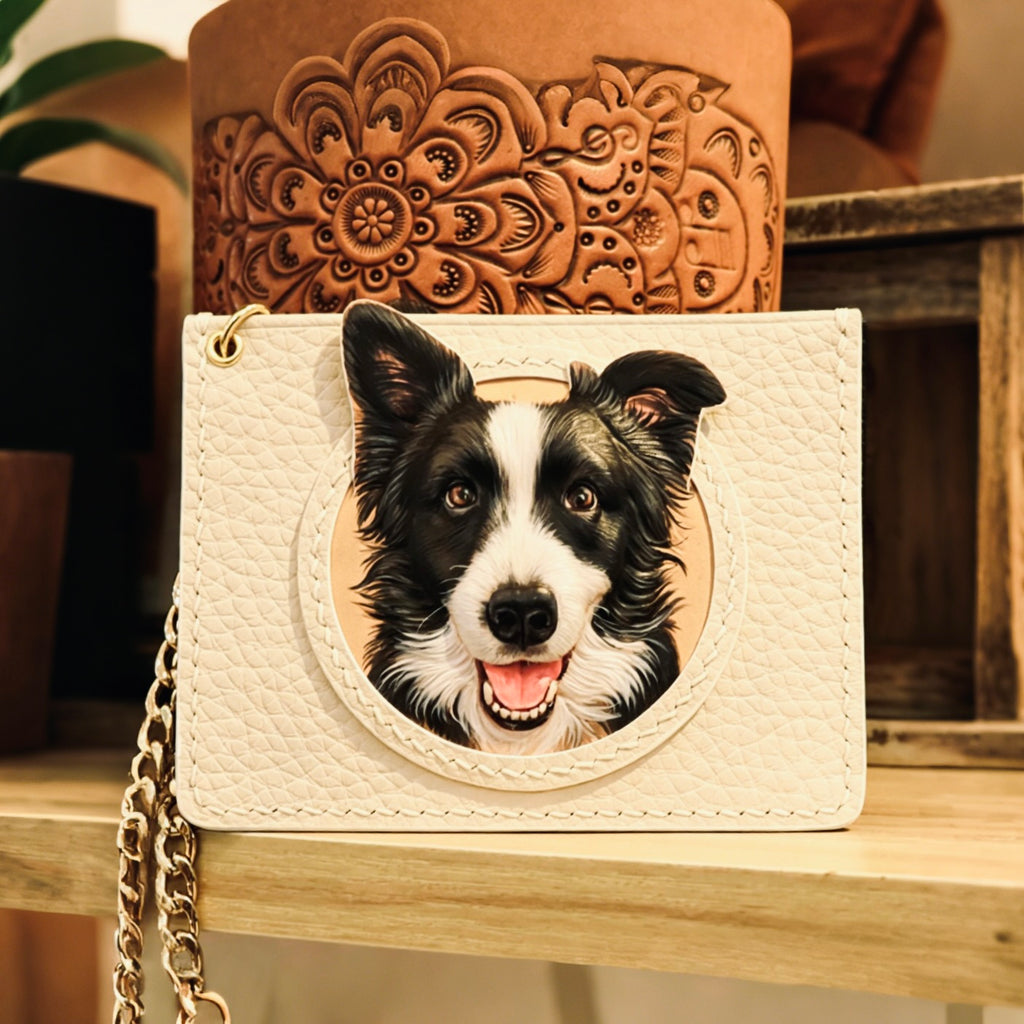 White handbag with a dog illustration on a wooden surface