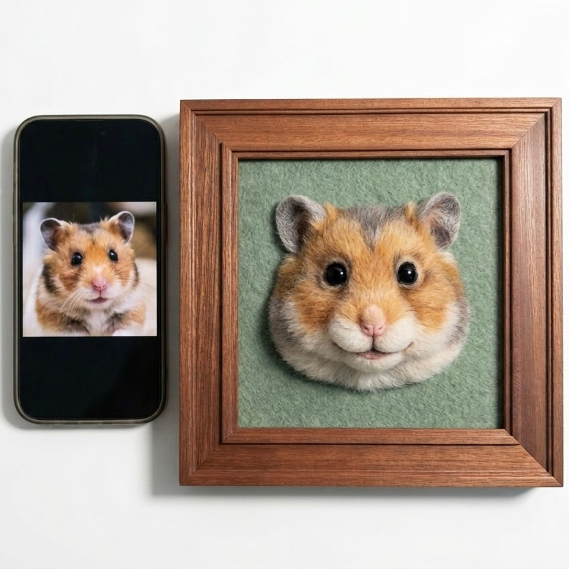 Framed picture of a hamster next to a smartphone displaying a similar image.