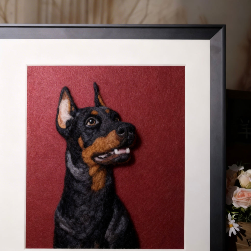 Framed artwork of a dog's head on a red background
