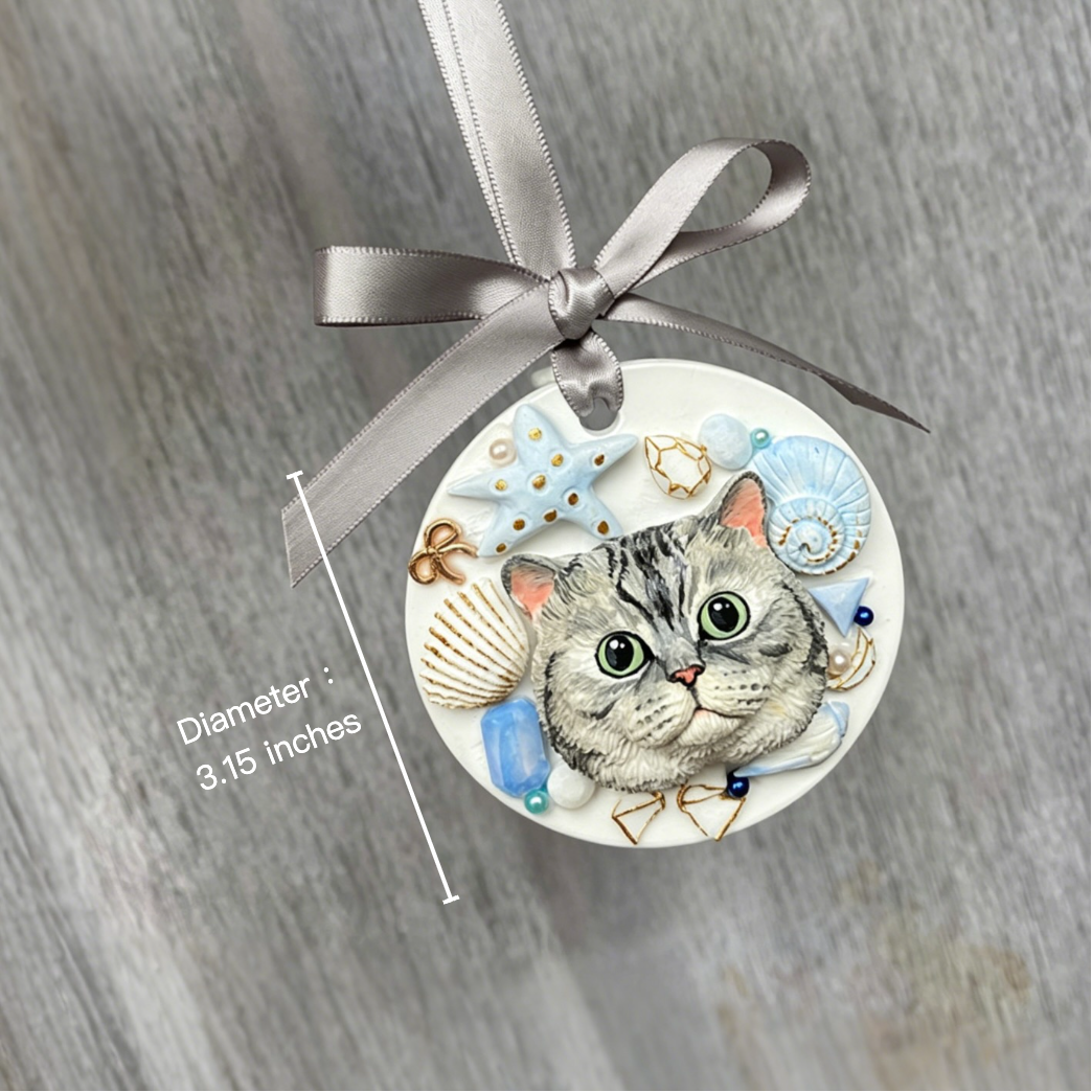 Decorative ornament with a cat illustration and decorative elements on a gray background