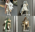 Four keychains with different color options displayed against a neutral background.