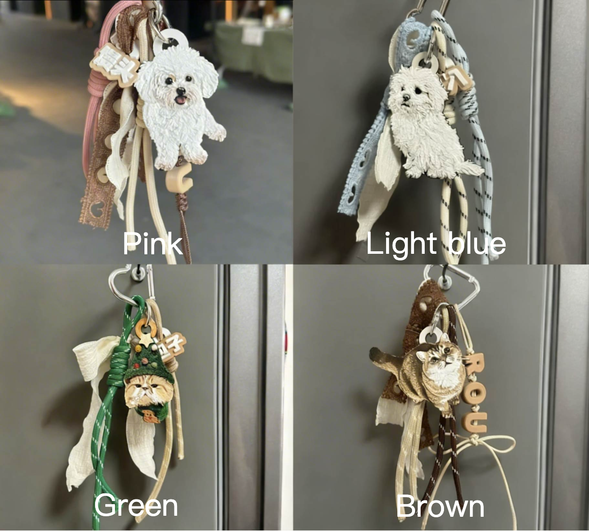 Four keychains with different color options displayed against a neutral background.