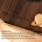 Wooden planet model with engraved text and embedded planet symbol