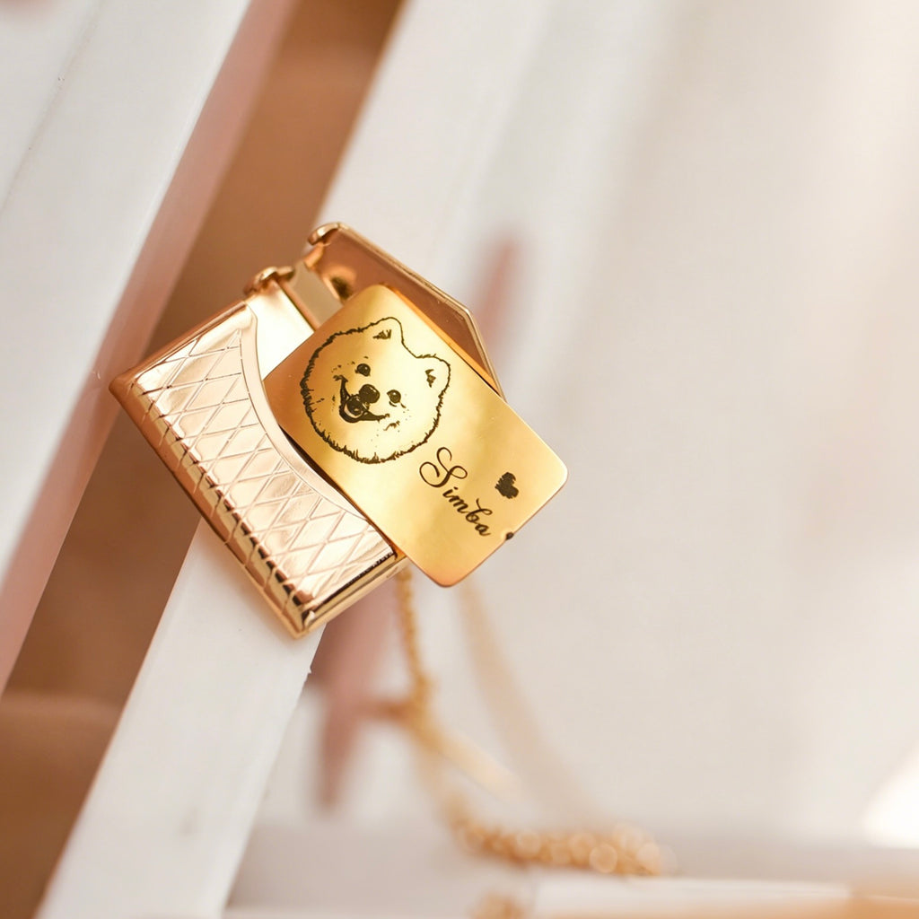 Gold dog tag with a dog's face engraving on a soft background