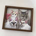 Framed artwork of four cats on a white wall