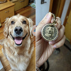 Happy dog next to a keychain with a dog's face on it