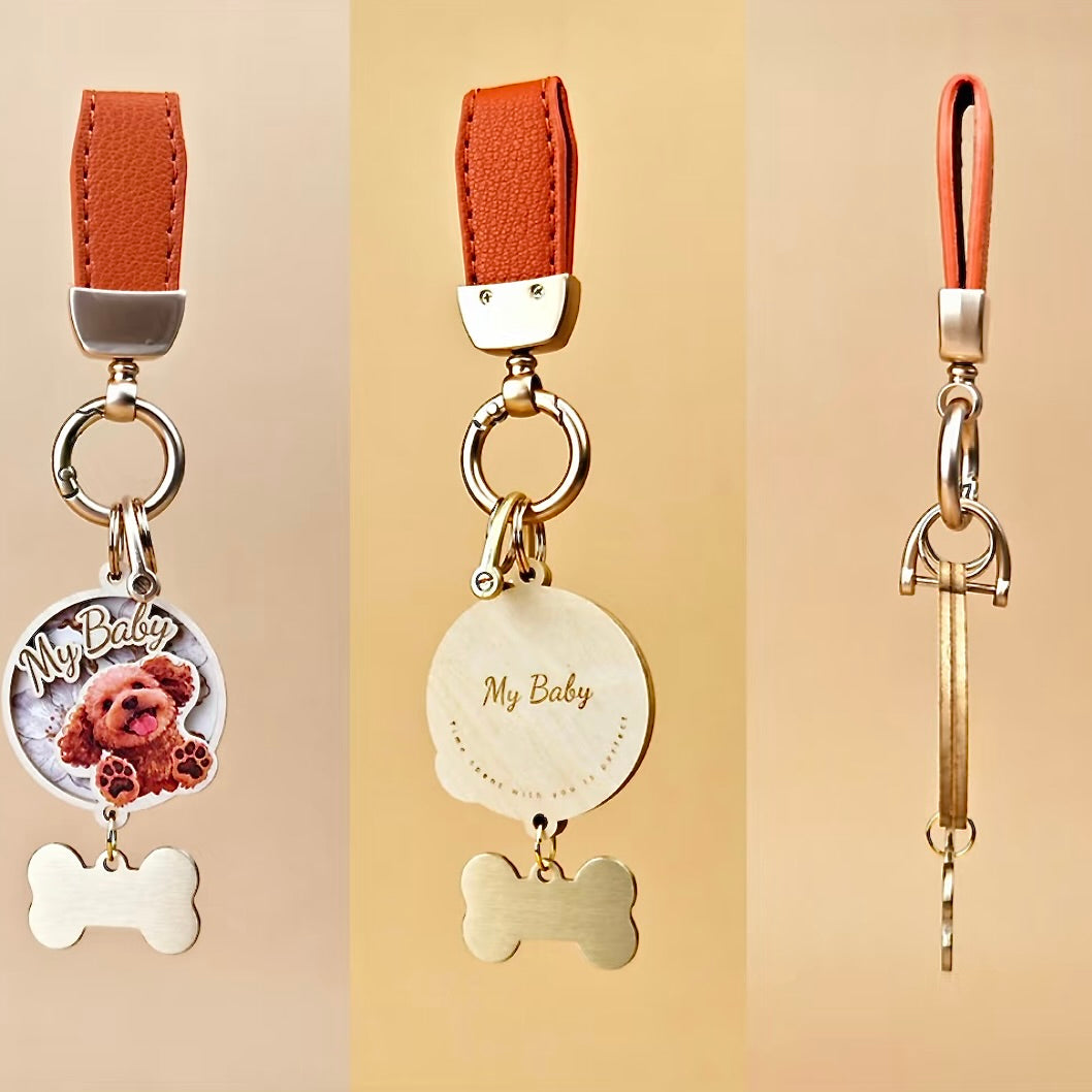The keychains feature brown leather straps, silver metal hardware, and a small, blank wooden bone tag hanging below the main portrait for personalized engraving. A perfect, high-quality pet remembrance gift.