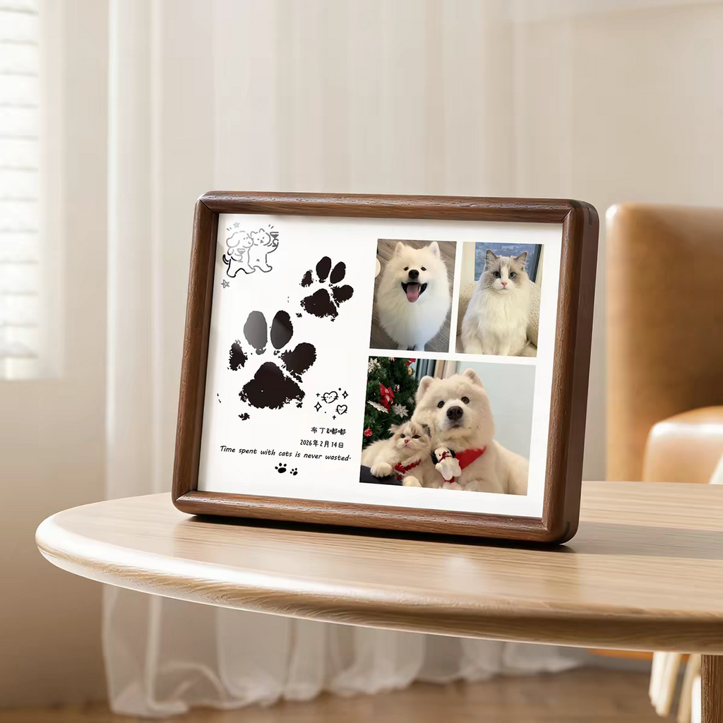 Wooden photo frame with pet pictures on a table