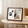Wooden photo frame with pet pictures on a table