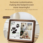 Wooden photo frame with pet paw print and images of a dog and cat on a beige background.