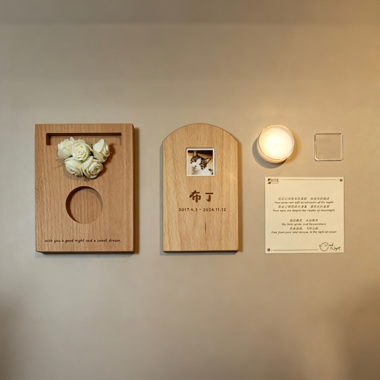 Wooden wall art pieces with floral and photo designs on a beige wall.