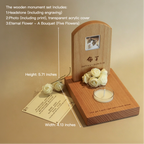 Wooden monument set with headstone, photo, and flowers on a beige background