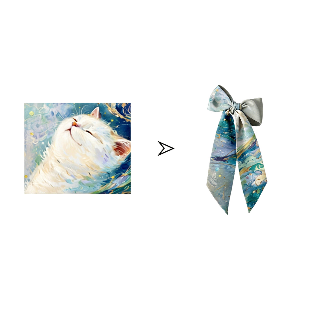 Marble-patterned scarf with a bow next to an illustration of a white cat.