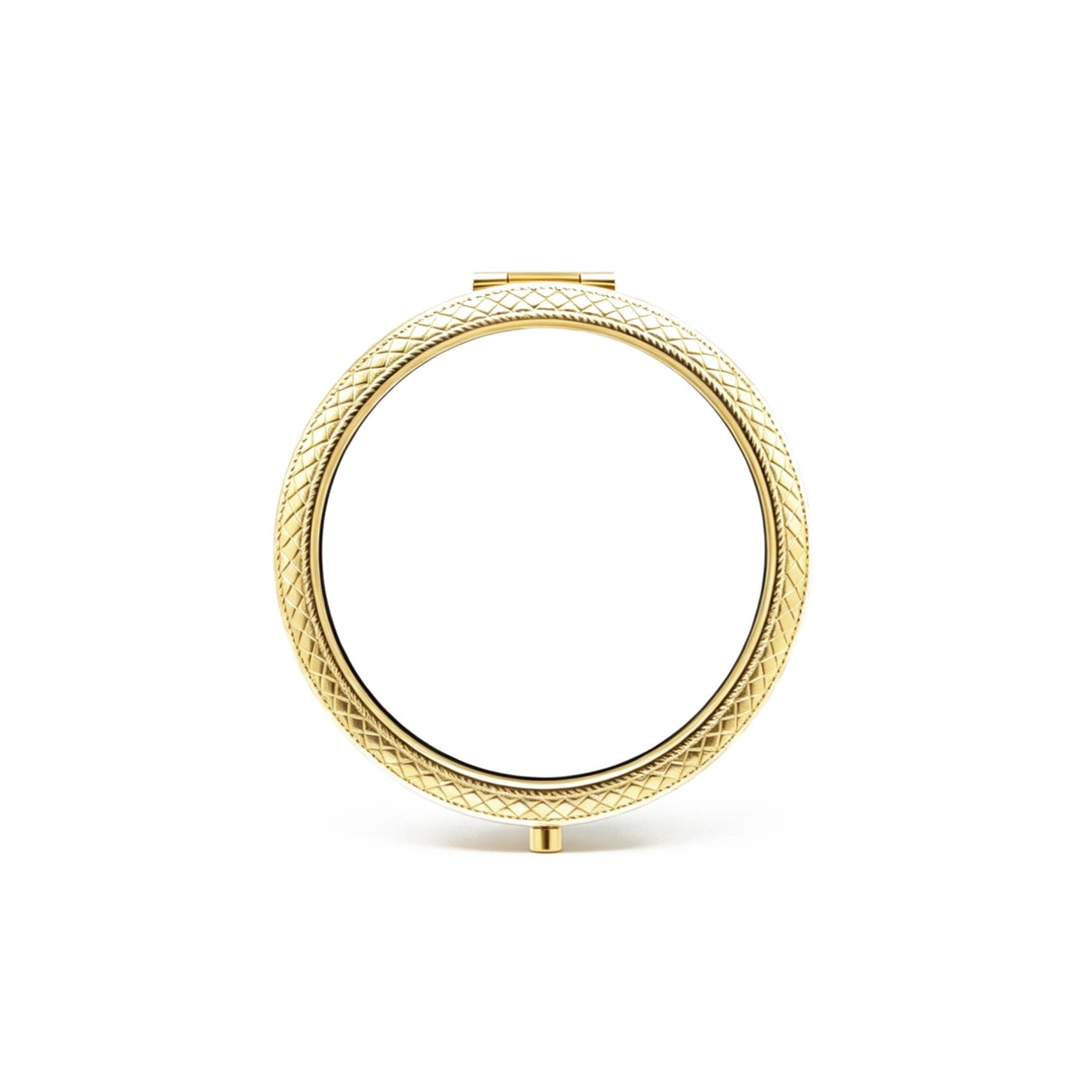Gold circular mirror with textured frame on a white background