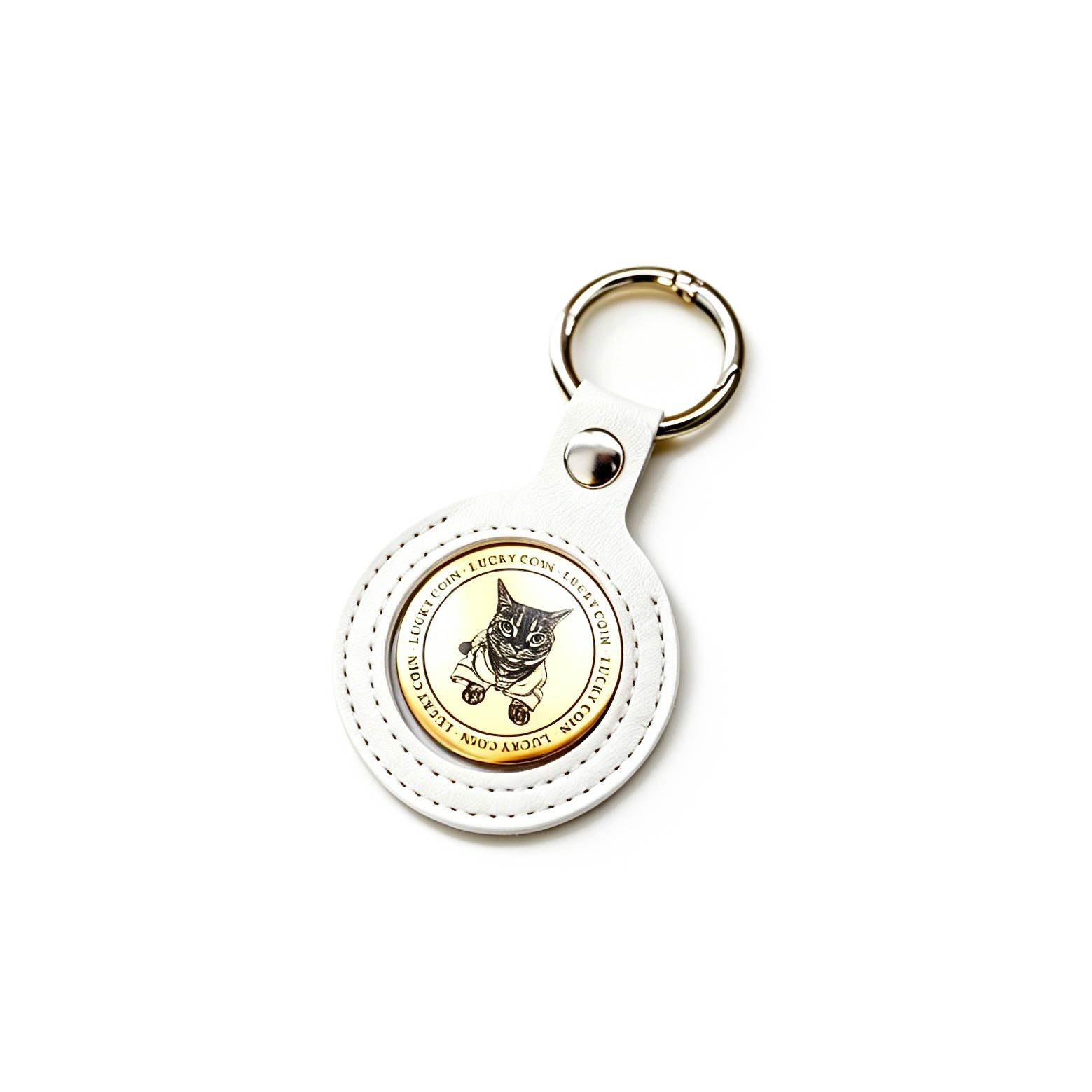 Round keychain with a cat design on a white background