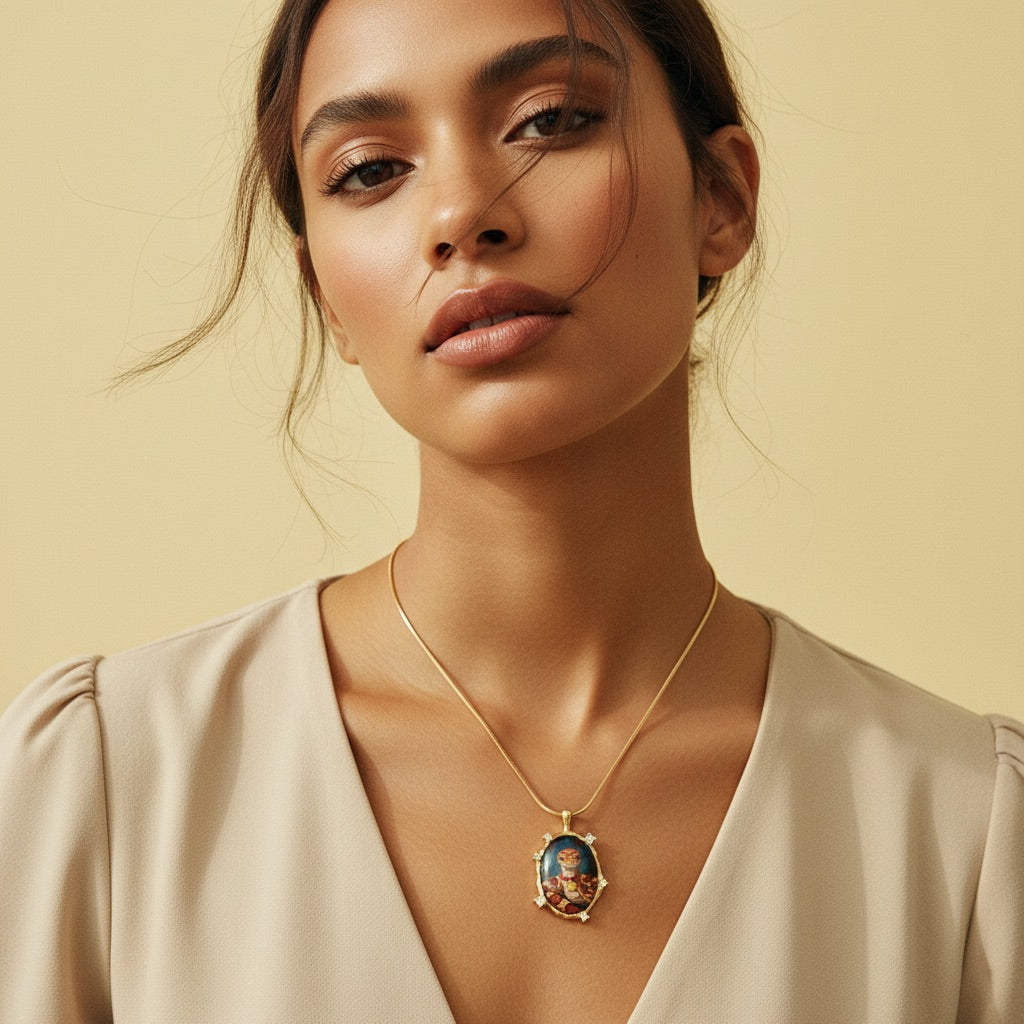 Woman wearing a gold necklace with a pendant against a beige background
