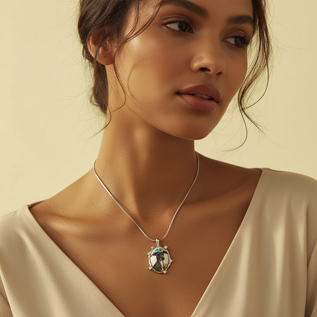 Woman wearing a necklace with a pendant against a beige background