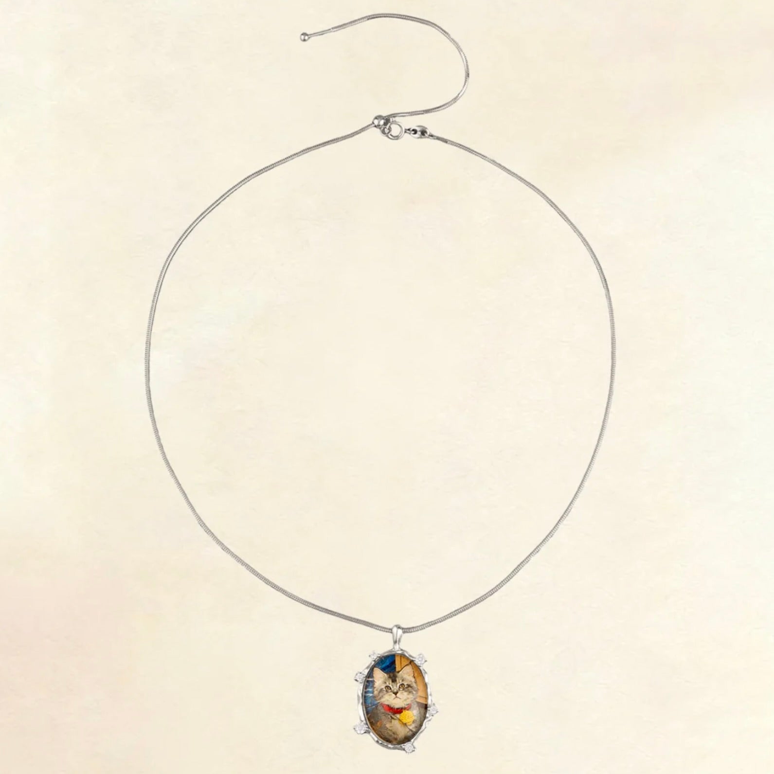 Necklace with a pendant on a beige background