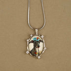 Necklace with a pendant featuring a dog's portrait on a beige background