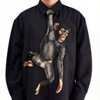 Black shirt with a monkey design on a white background