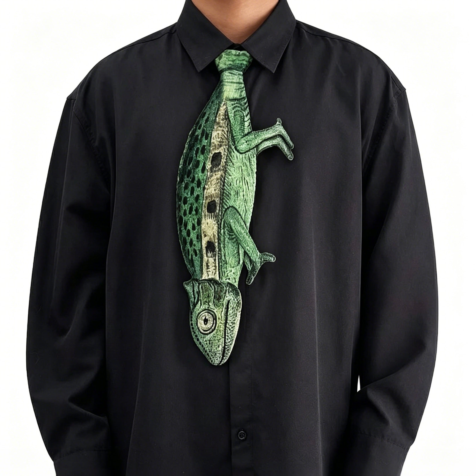 Black shirt with a green lizard-shaped tie on a white background