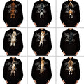 Black shirts with dog illustrations and text on a white background