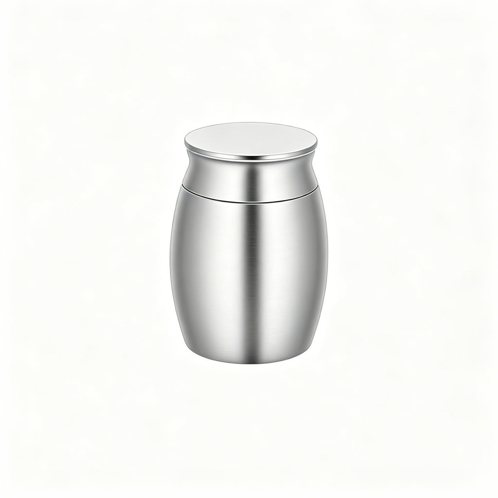 Stainless steel urn on a white background