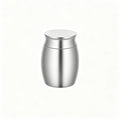 Stainless steel urn on a white background