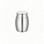 Stainless steel urn on a white background