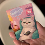 Card with a cat holding a remote control, text 'Whatever' and 'May 28 Tuesday'.
