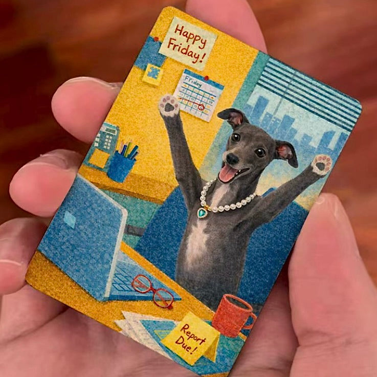 Small card with a dog illustration and 'Happy Friday!' text, held in a hand.
