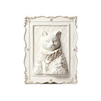 Decorative wall art of a cat with a decorative frame on a white background