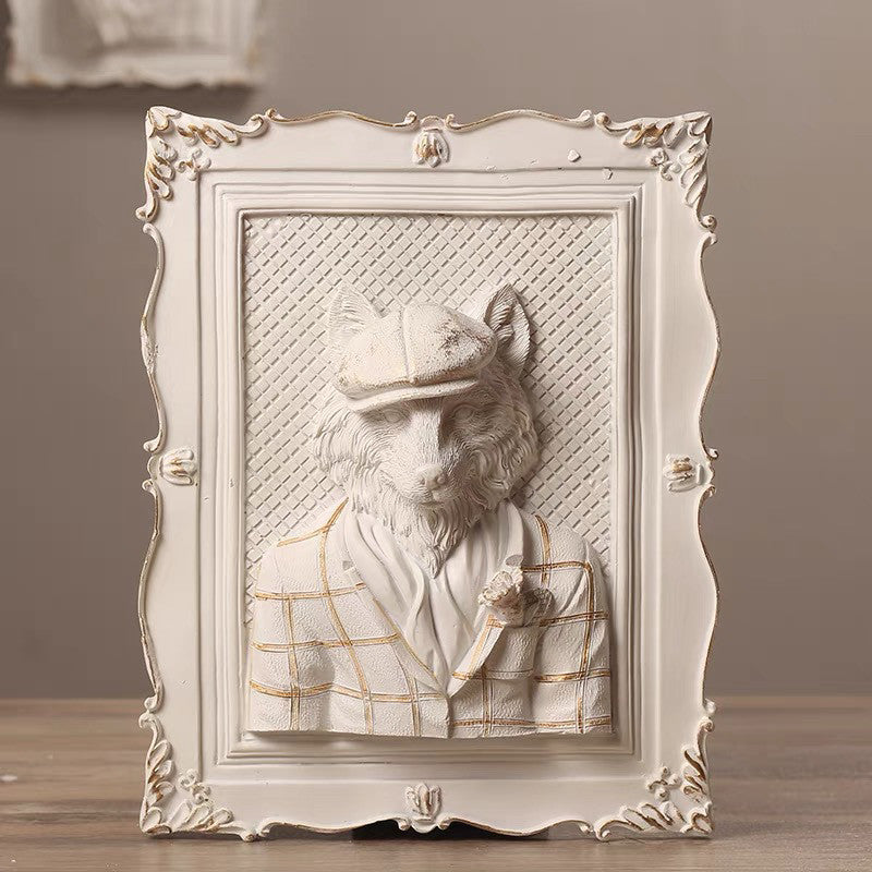 Decorative wall art of a bear wearing a suit and hat in an ornate frame.